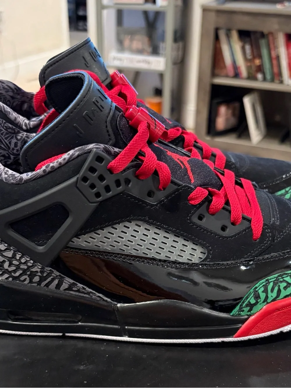 Nike Jordan Spizike “black varsity red”featuring unique circular patches on heal